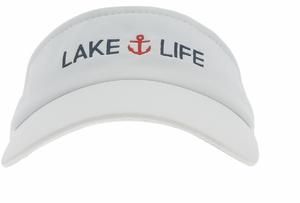 A white Dri-Fit visor with the words "LAKE LIFE" and a red anchor embroidered on the front, exuding a maritime vibe.